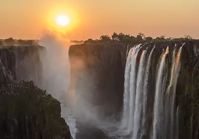 Namibia Botswana Gruppenreise Victoria Falls Sonnenuntergang